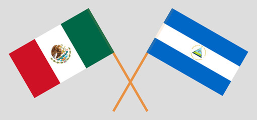 Crossed flags of Mexico and Nicaragua. Official colors. Correct proportion