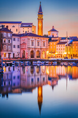 Fototapeta premium Piran, Slovenia - Marina twilight view with Tartini Square.