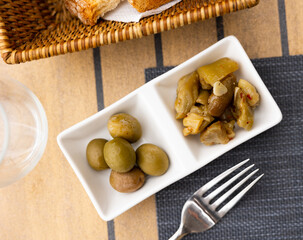 Pickled eggplant and olives appetizer closeup