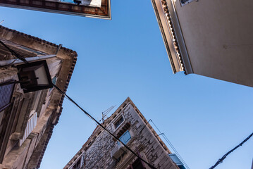 Fototapeta na wymiar old houses in the city of rovinij with sky
