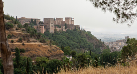 The ancient arabic fortress Alhambra at beautiful evening time, Granada, Spain. A European travel landmark and most visited monument in all of Spain	