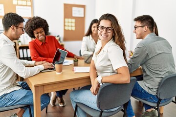 Group of business workers smiling happy working at the office.