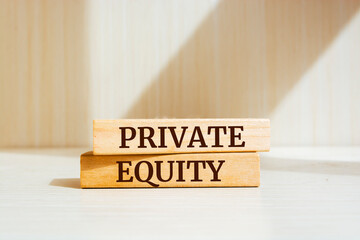 Wooden blocks with words 'Private Equity'.