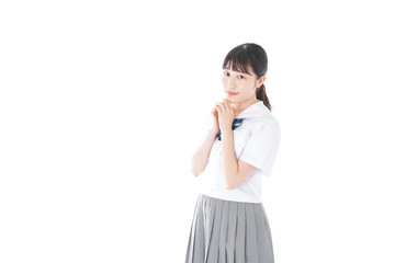 Schoolgirl with smile wearing uniform
