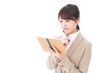 Woman writing something with thinking