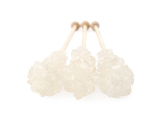 Wooden sticks with sugar crystals isolated on white. Tasty rock candies