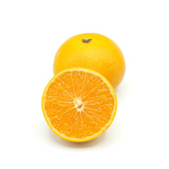 Halved oranges and one oranges look fresh appetizing on white background.