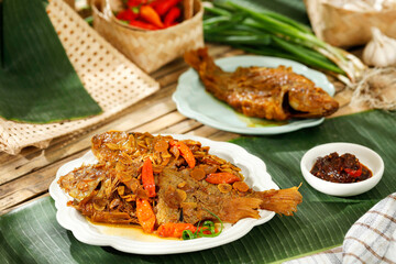 Pindang Ikan Nila, Sundanese Traditional Menu from West Java Indonesia, Made from Fried Tilapia Fish with Chilli