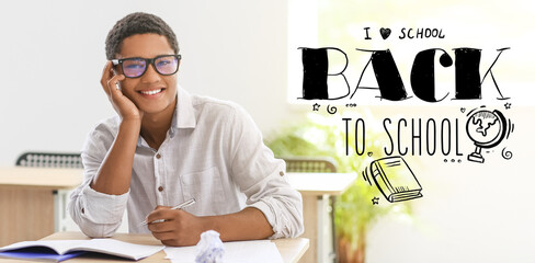 African-American student in classroom. Back to school