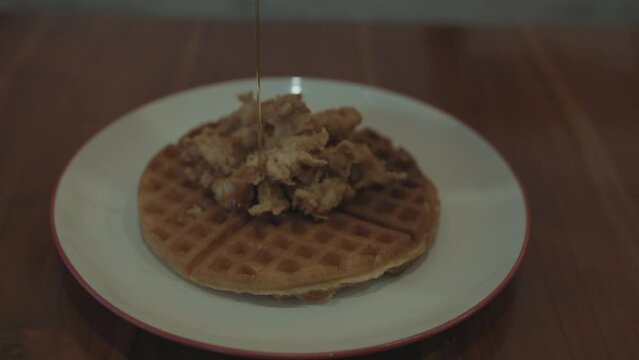 Crispy Waffle Pancake Topped American Style Fried Chicken and Sugar Syrup