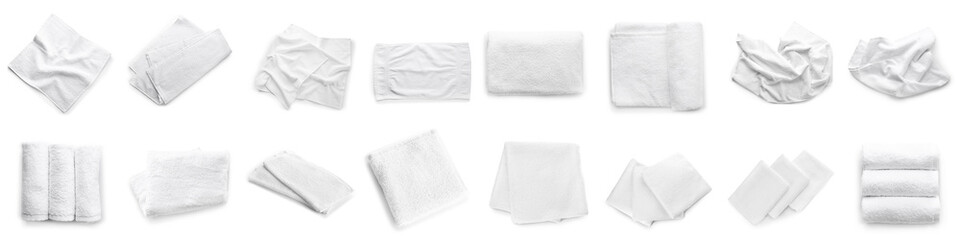 Set of clean soft towels on white background, top view