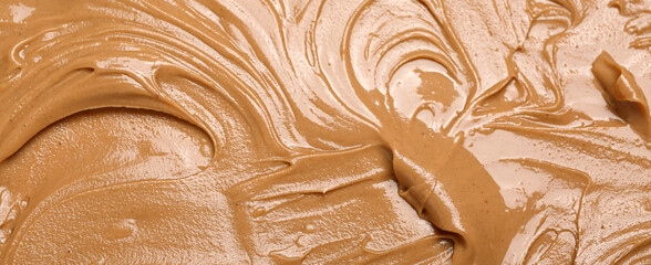 Texture of nut butter as background, closeup