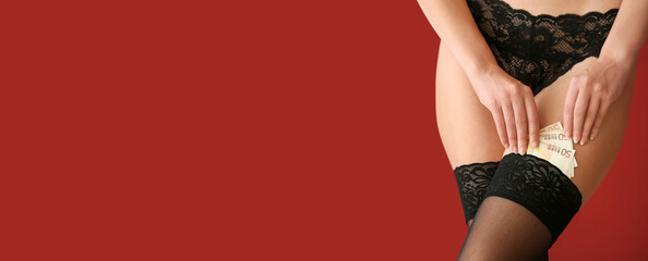 Young prostitute with money in stockings on red background with space for text