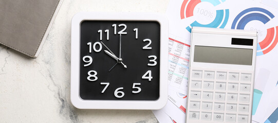 Clock, calculator and documents on table. Time management concept