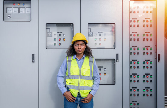 Engineer checking and inspecting at MDB panel , working with electric switchboard to check medium Voltage Switchgear working in Main Distribution Boards factory.