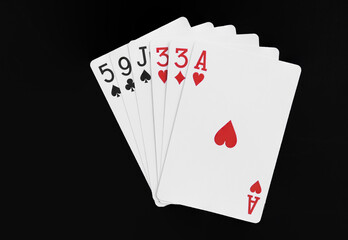 Royal playing cards on a black background.