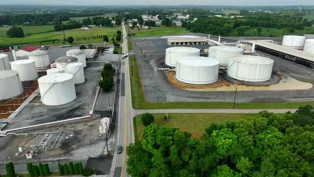 Wide aerial of fuel terminal in USA. Oil and gas storage tanks in United States.