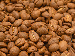 Macro shot of fresh aromatic roasted coffee beans