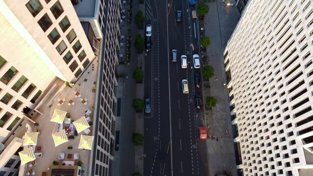 bikini berlin monkey bar rooftop church. Gorgeous aerial view flight tilt up drone footage of breitscheidplatz charlottenburg sunny Summer Evening 2022. 4k Cinematic from above by Philipp Marnitz