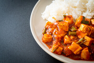 Mapo Tofu - The traditional Sichuan dish of silken tofu and ground beef, packed with mala flavor from chili oil and Sichuan peppercorns.