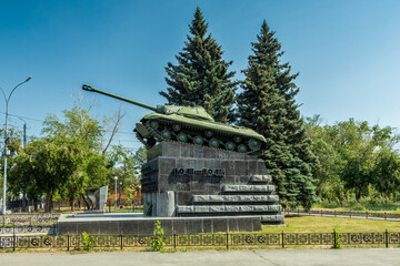 Fototapeta na wymiar Monument with an IS-3 tank on Komsomolskaya Square in Chelyabinsk, Russia.