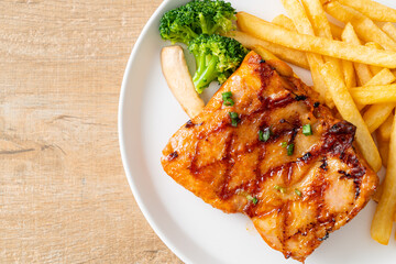 grilled chicken steak with potato chips or french fries