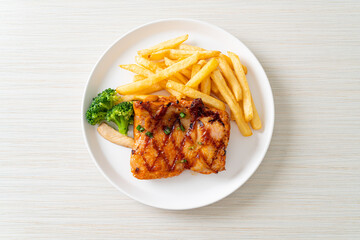 grilled chicken steak with potato chips or french fries