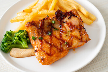 grilled chicken steak with potato chips or french fries