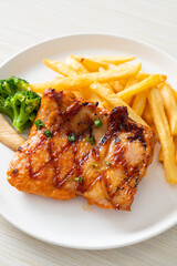 grilled chicken steak with potato chips or french fries