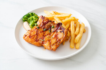 grilled chicken steak with potato chips or french fries