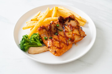 grilled chicken steak with potato chips or french fries