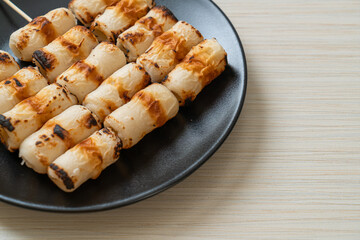 grilled tube shaped fish paste cake skewe or tube squid skewer