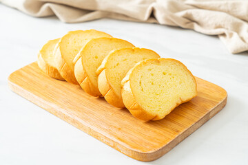 potatoes bread sliced on wood board