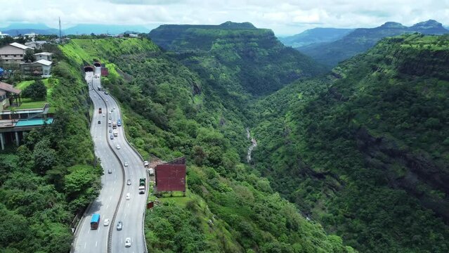 The Mumbai-Pune Expressway during the monsoon season at Khandala near Pune India. The Expressway is officially called the Yashvantrao Chavan Expressway.
