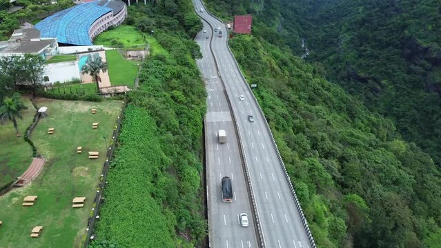 The Mumbai-Pune Expressway during the monsoon season at Khandala near Pune India. The Expressway is officially called the Yashvantrao Chavan Expressway.