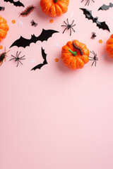 Halloween concept. Top view vertical photo of bat silhouettes pumpkins insects spiders cockroach...
