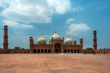 historical building in Lahore , beautiful picture of badshahi mosque in blue sky and white clouds 