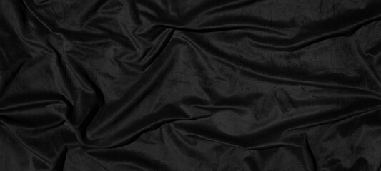 Beautiful smooth elegant wavy black satin silk luxury cloth fabric texture, abstract background...