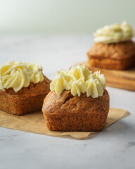 Carrot Cake cube on white backdrop