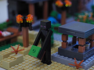 Fototapeta premium Elements and fragments of Lego village world set. Characters of electronic game Minecraft. Children's designer with small details, developing motor skills and imagination.