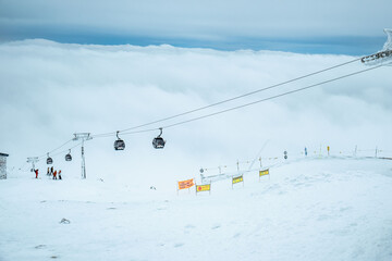 Obraz premium Slovakia, Jasna - January 31, 2022: chair lift cabin ski resort
