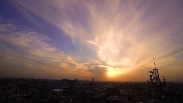 Slow Motion kite flying festival Basant in Pakistan in the evening with city from the top view