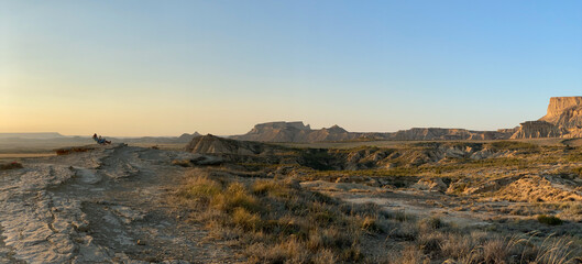 Fototapeta na wymiar Panoramic desert mountain. The Royal Bardenas. Desert modeled almost lunar landscape.