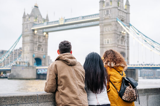 London, United Kingdom, Group of friends looking at Tower Bridge