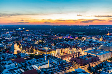 Germany, Saxony, Leipzig, Illuminated city center at dusk