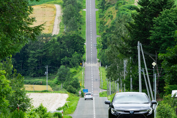 北海道のジェットコースターの路、かみふらの八景 - obrazy, fototapety, plakaty