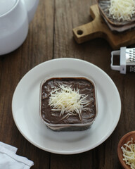 Chocolate dessert box, with cheese topping, creamy and delicious. 
