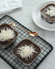 Chocolate dessert box, with cheese topping, creamy and delicious. 
