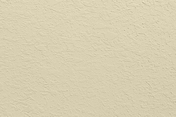 Saturated pastel light beige colored low contrast Concrete textured background. Empty colourful wall texture with copy space for text overlay and mockups. 2023, 2024 color trend