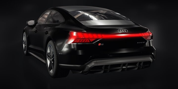 Paris, France. January 25, 2022: Audi E-Tron GT 2021. Premium sports sedan. Car isolated on black background. 3d rendering.